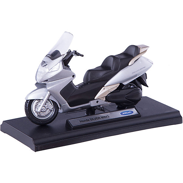 Модель мотоцикла 1:18 Honda Silver Wing , Welly Модель мотоцикла 1:18 Honda Silver Wing , WellyМашинки<br>Модель мотоцикла 1:18 Honda Silver Wing , Welly (Велли) - точная копия настоящего максискутера Honda Silver Wing выполненная в масштабе 1:18 c высокой степенью детализации. Игрушка выполнена из прочного металла с пластиковыми элементами. Корпус изготовлен литьевым способом, что обеспечивает высокую прочность и долговечность в использовании, а также максимальную похожесть на оригинал.<br><br>С моделью мотоцикла 1:18 Honda Silver Wing , Welly можно не только играть, но и сделать его частью своей коллекции!<br><br>Дополнительная информация:<br><br>- Размер: 17 х 7 х 11 см<br>- Материал: металл, пластик<br>- Вес: 180 г.<br><br>Модель мотоцикла 1:18 Honda Silver Wing , Welly (Велли) можно купить в нашем интернет-магазине.<br><br>Ширина мм: 170<br>Глубина мм: 70<br>Высота мм: 110<br>Вес г: 180<br>Возраст от месяцев: 36<br>Возраст до месяцев: 192<br>Пол: Мужской<br>Возраст: Детский<br>SKU: 3593303