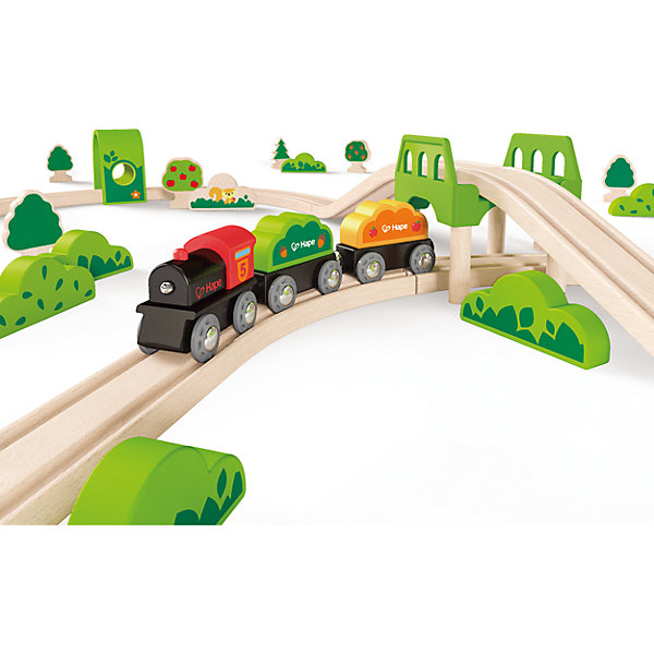 Игровой набор Железная дорога, Hape Игровой набор Железная дорога, HapeЖелезные дороги<br>Игровой набор Железная дорога, Hape (Хейп).<br><br>Характеристики:<br><br>- В наборе: элементы для сборки железной дороги, зеленый мостик, 2 тоннеля, паровозик и два вагончика, фигурки деревьев, кустов и изображения животных <br>- Количество деталей: 54<br>- Протяженность железнодорожного полотна 3 м.<br>- Размер в собранном виде: 81х100х10 см.<br>- Материал: древесина<br>- Размер упаковки: 48х12х45 см.<br><br>В игровой набор входит все необходимое для создания железной дороги, которая проходит через чудесный лес. Любуйся пейзажами, рассматривай деревья, кусты, диких животных и внимательно следи за маршрутом, так как паровозик с двумя вагонами должен проехать через два тоннеля и преодолеть мост. Железная дорога собирается из отдельных элементов по принципу пазла. Затруднений со сборкой железнодорожного полотна у ребенка не возникнет, так как элементы довольно крупные. Вагоны крепятся друг к другу магнитными элементами, расположенными в передней и задней частях, что позволяет беспрепятственно отсоединять их, комбинировать по ходу игры. Набор изготовлен из отлично отшлифованного, натурального дерева, окрашенного нетоксичной краской. Играя с набором Железная дорога, ребенок будет не только получать удовольствие от игры, но и развивать мелкую моторику рук, фантазию, воображение, координацию движений, конструкторские и игровые навыки.<br><br>Игровой набор Железная дорога, Hape (Хейп) можно купить в нашем интернет-магазине.<br><br>Ширина мм: 120<br>Глубина мм: 480<br>Высота мм: 360<br>Вес г: 2950<br>Возраст от месяцев: 36<br>Возраст до месяцев: 84<br>Пол: Мужской<br>Возраст: Детский<br>SKU: 5309152