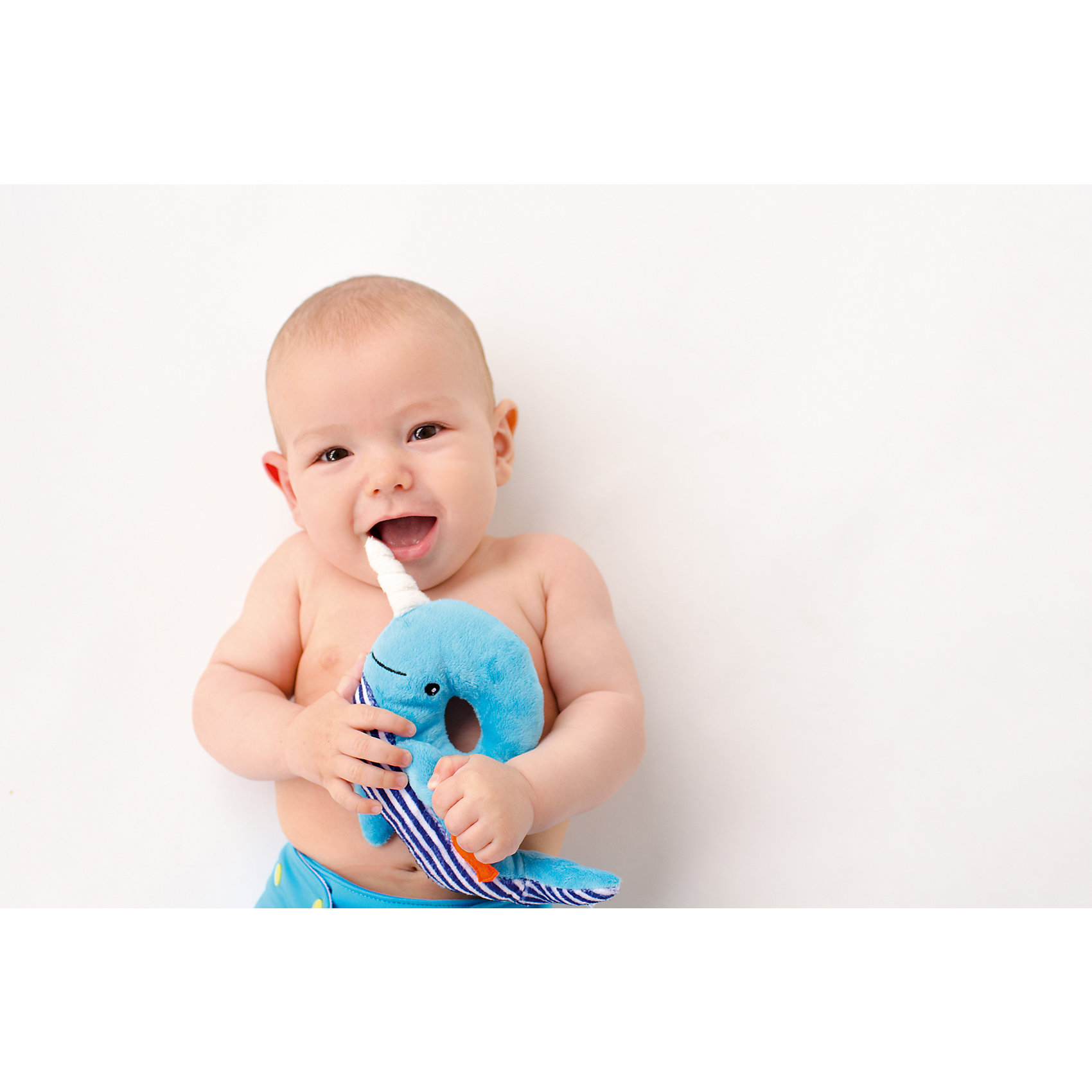 Погремушка Кит, Zoocchini, синий Погремушка Кит, Zoocchini, синийПогремушки<br>Погремушка Кит, Zoocchini, синий.<br><br>Характеристики:<br><br>- Материал: полиэстер<br>- Цвет: синий<br>- Длина игрушки: 20 см.<br><br>Мягкая, приятная на ощупь погремушка в виде забавного кита заставит вашего ребёнка улыбаться! Яркий цвет, приятный звук погремушки будут способствовать развитию слухового и цветового восприятия, мелкой моторики рук и концентрации внимания малыша. Погремушка Кит составит прекрасную пару одеялу с игрушкой Zoocchini.<br><br>Погремушку Кит, Zoocchini, синюю можно купить в нашем интернет-магазине.<br><br>Ширина мм: 120<br>Глубина мм: 75<br>Высота мм: 205<br>Вес г: 72<br>Возраст от месяцев: 0<br>Возраст до месяцев: 12<br>Пол: Унисекс<br>Возраст: Детский<br>SKU: 5392935