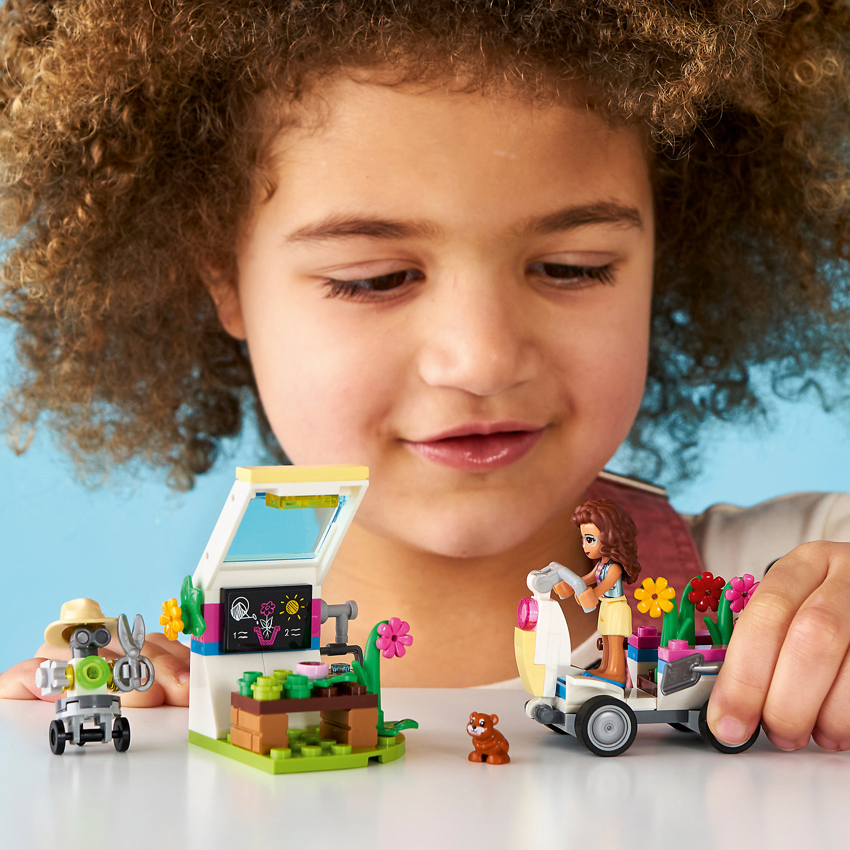 фото Конструктор lego friends 41425: цветочный сад оливии